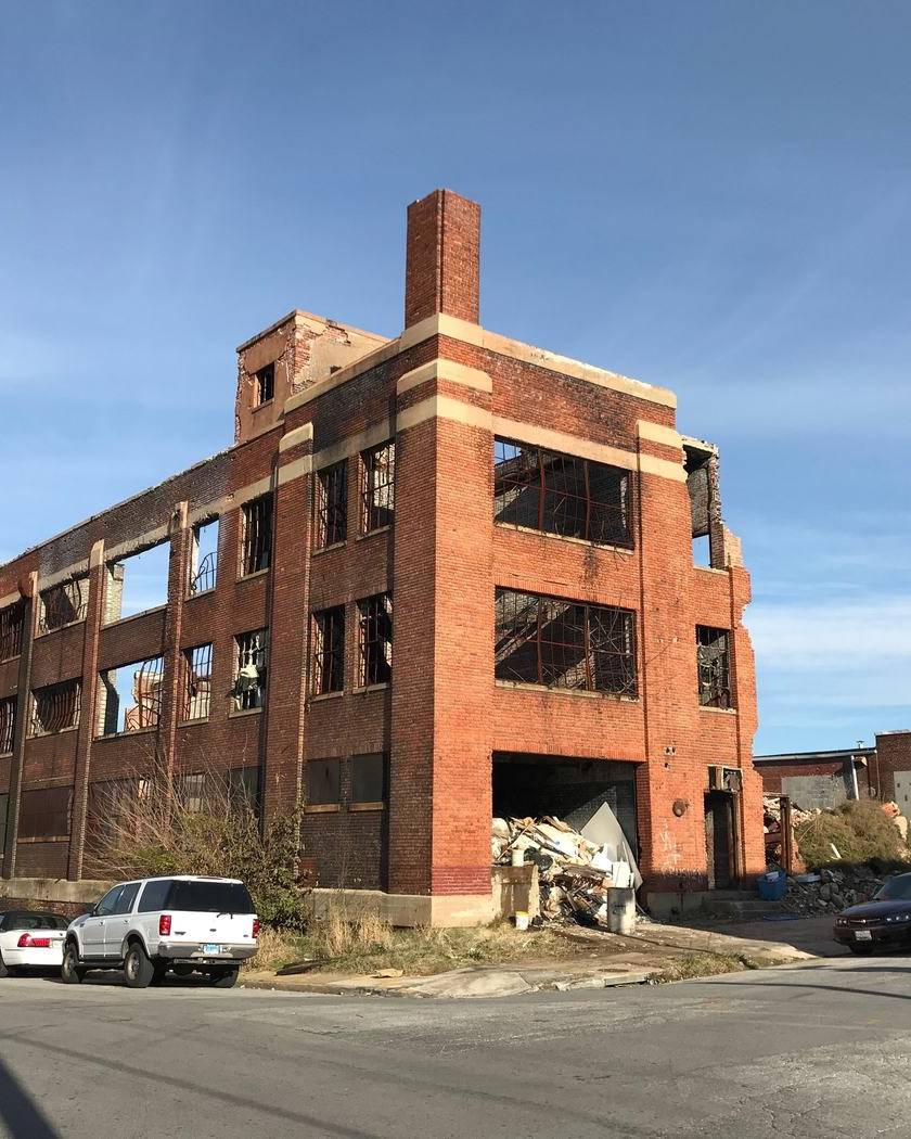 Fire-damaged commercial brick building
